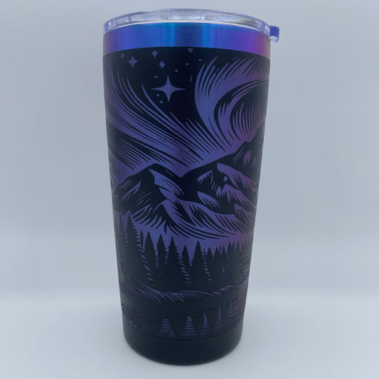 Aurora Mountain engraved tumbler in blue and purple rainbow finish with laser engraved northern lights and mountain design