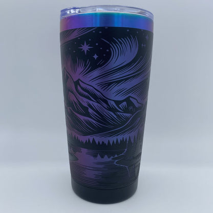 Aurora Mountain engraved tumbler in blue and purple rainbow finish with laser engraved northern lights and mountain design
