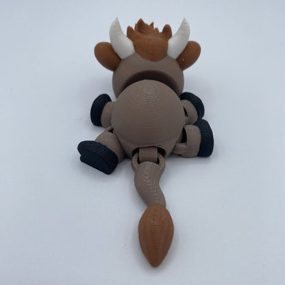 Charlie the Lounging Highland Cow