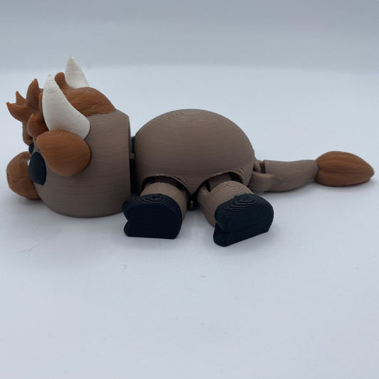 Charlie the Lounging Highland Cow