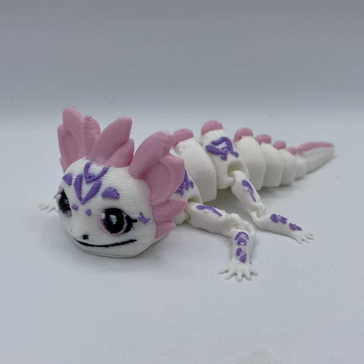 Poseable happy axolotl shown from another angle