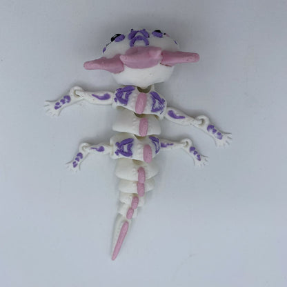 Happy axolotl on a desk as décor