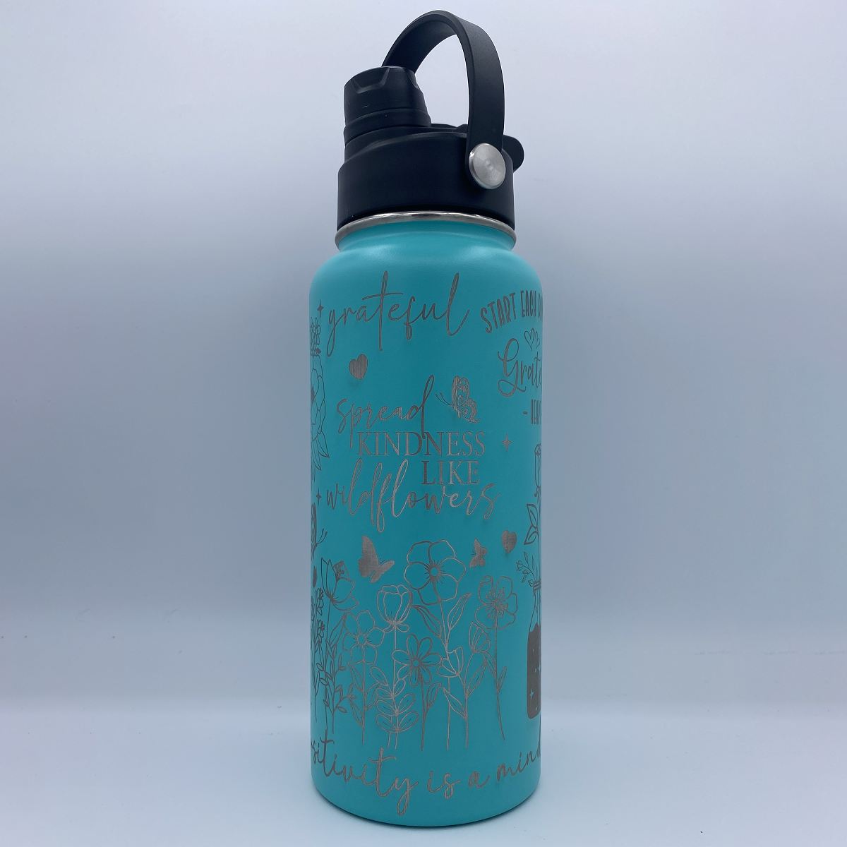 Teal 32oz Happy Thoughts laser engraved motivational water bottle with dual lid