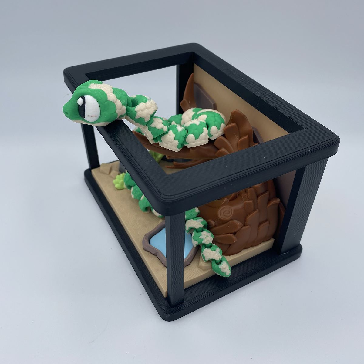 Reptile enclosure with a snake 3D printed diorama
