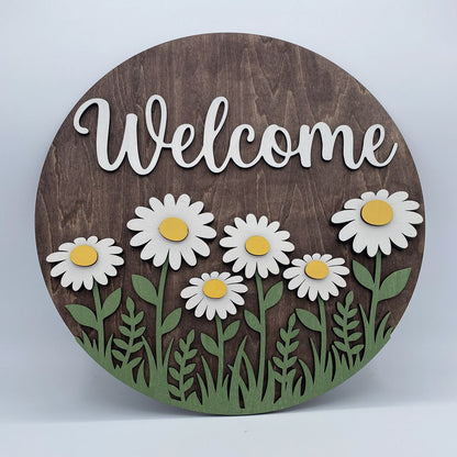 Fully layered Welcoming Daisies laser-cut wood door sign with the word Welcome