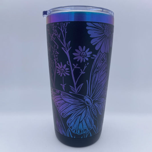 Wildflowers and Butterflies engraved tumbler in blue and purple rainbow finish with laser engraved floral design
