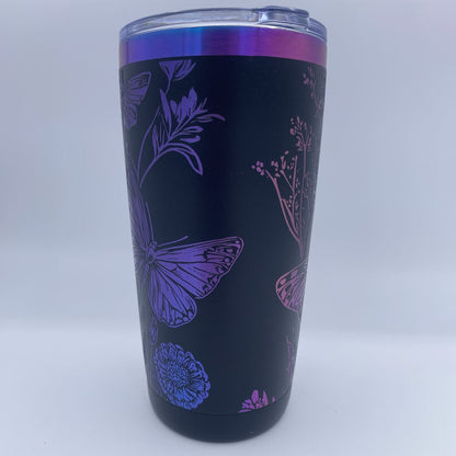 Wildflowers and Butterflies engraved tumbler in blue and purple rainbow finish with laser engraved floral design