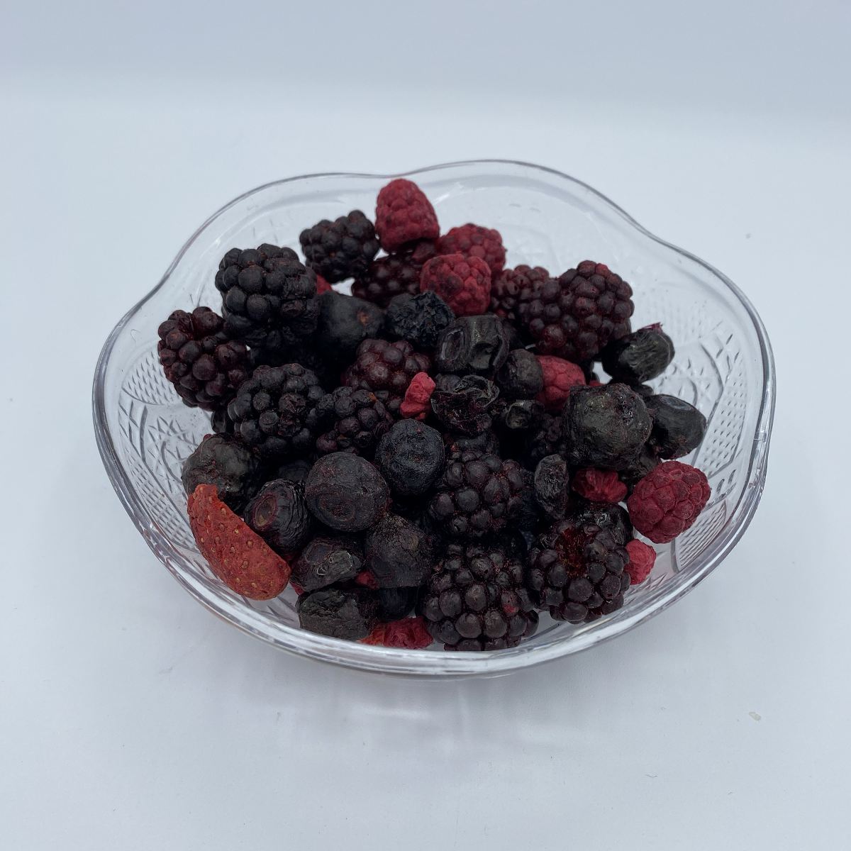 Close up of crunchy freeze-dried Berry Medley showing strawberries blueberries blackberries and raspberries

